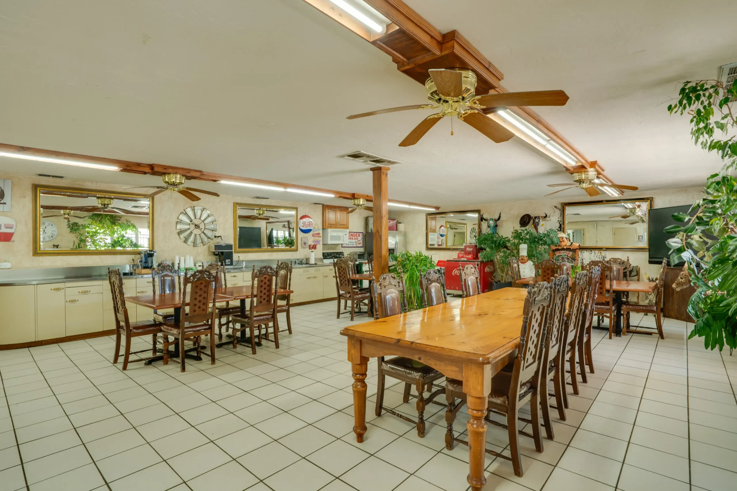 Dining Area Wichita Falls RV Park Spacious clubhouse at Wichita Falls RV Park featuring comfortable seating, dining tables, complimentary coffee, gathering space, and welcoming community atmosphere year-round.