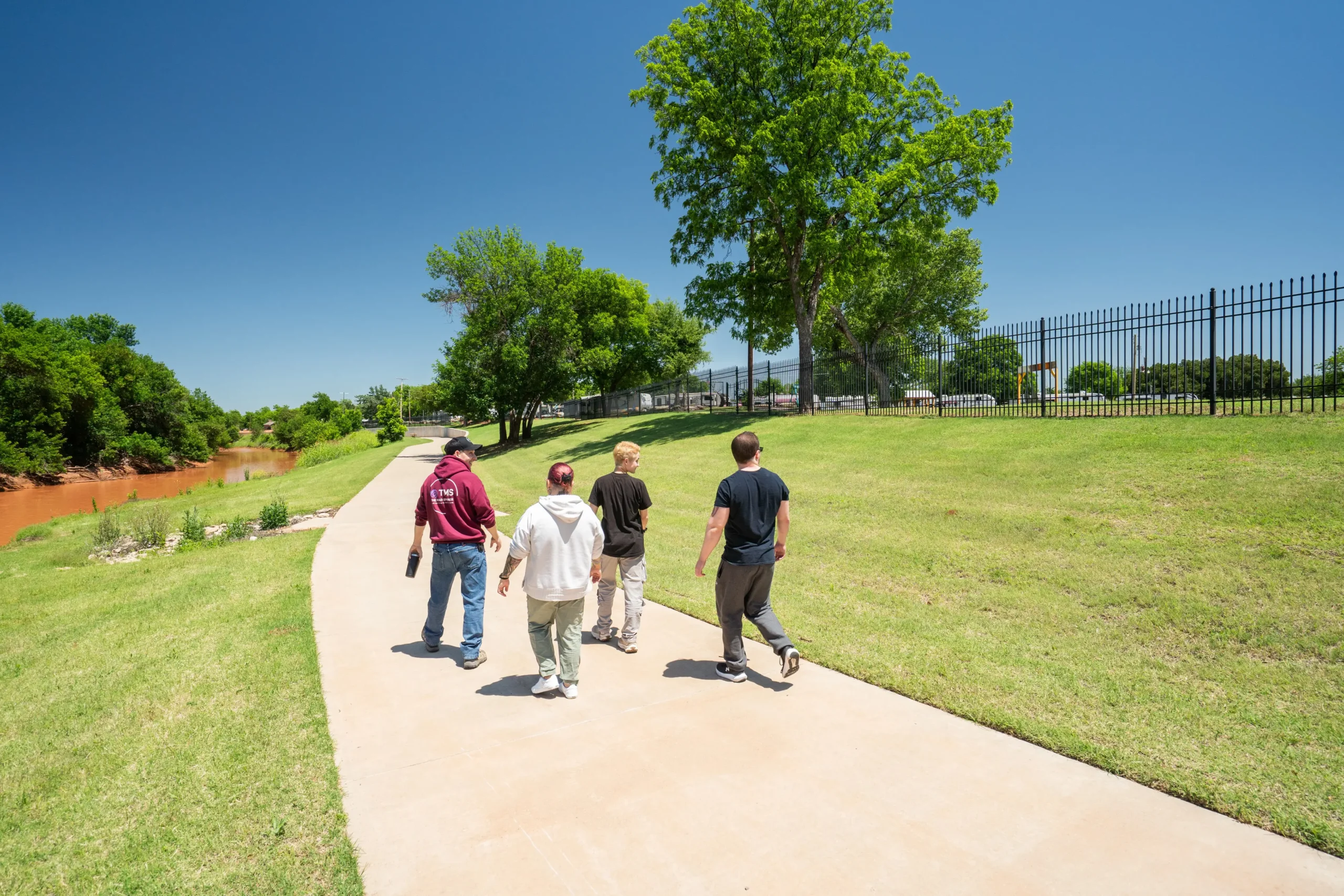 Hike & Bike Trails at Wichita Falls RV Park Scenic walking trail at Wichita Falls RV Park offers peaceful riverside views, shaded pathways, outdoor recreation, and relaxing nature walks for guests.